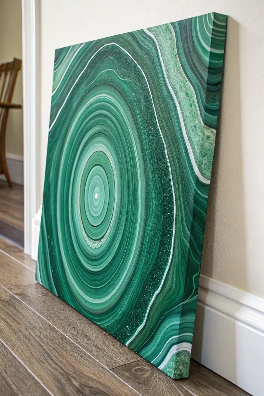 Malachite-inspired emerald swirls with crisp white rings for a calm, modern green canvas idea