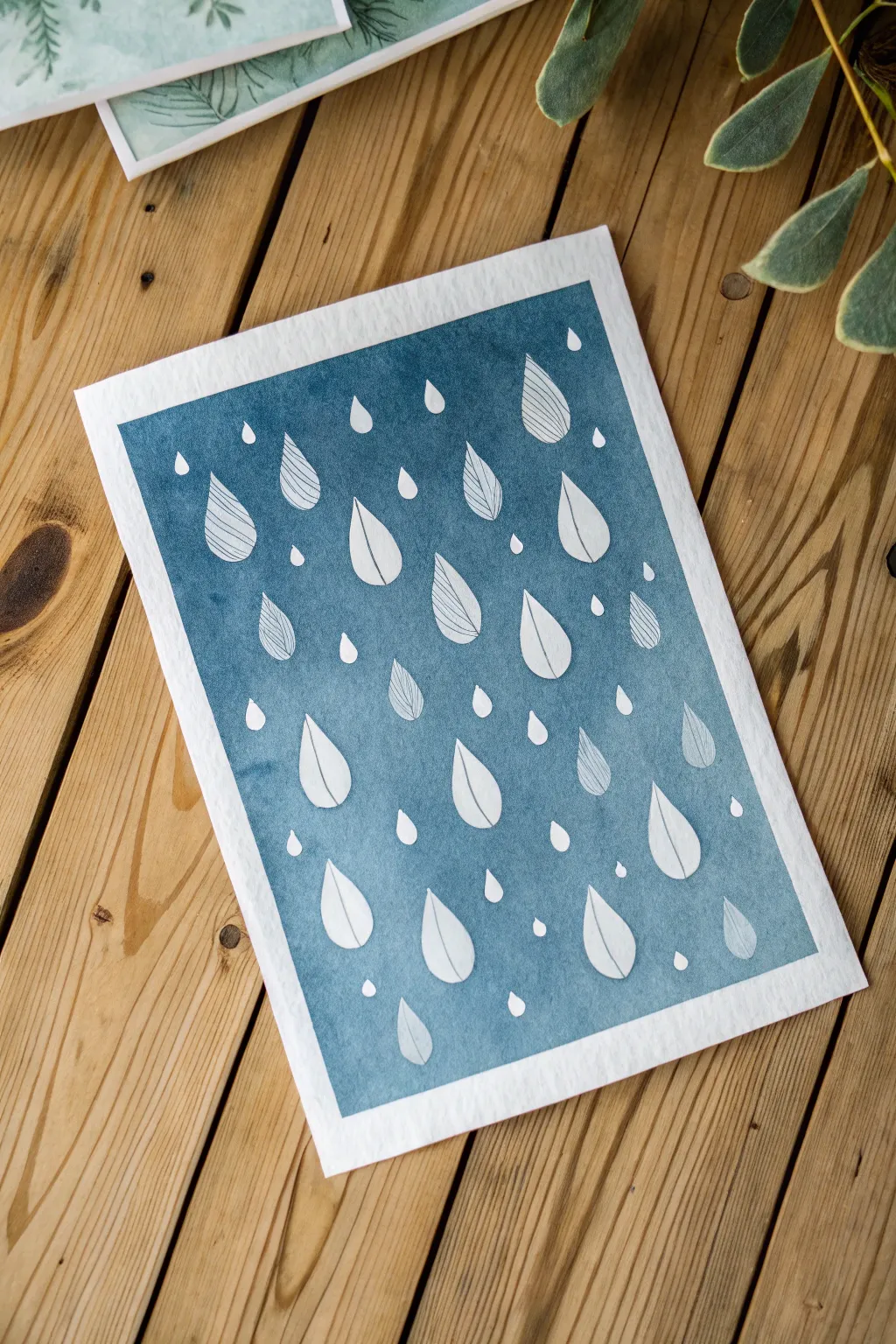 Droplet resist magic: crisp white raindrop highlights glowing against a soft moody wash