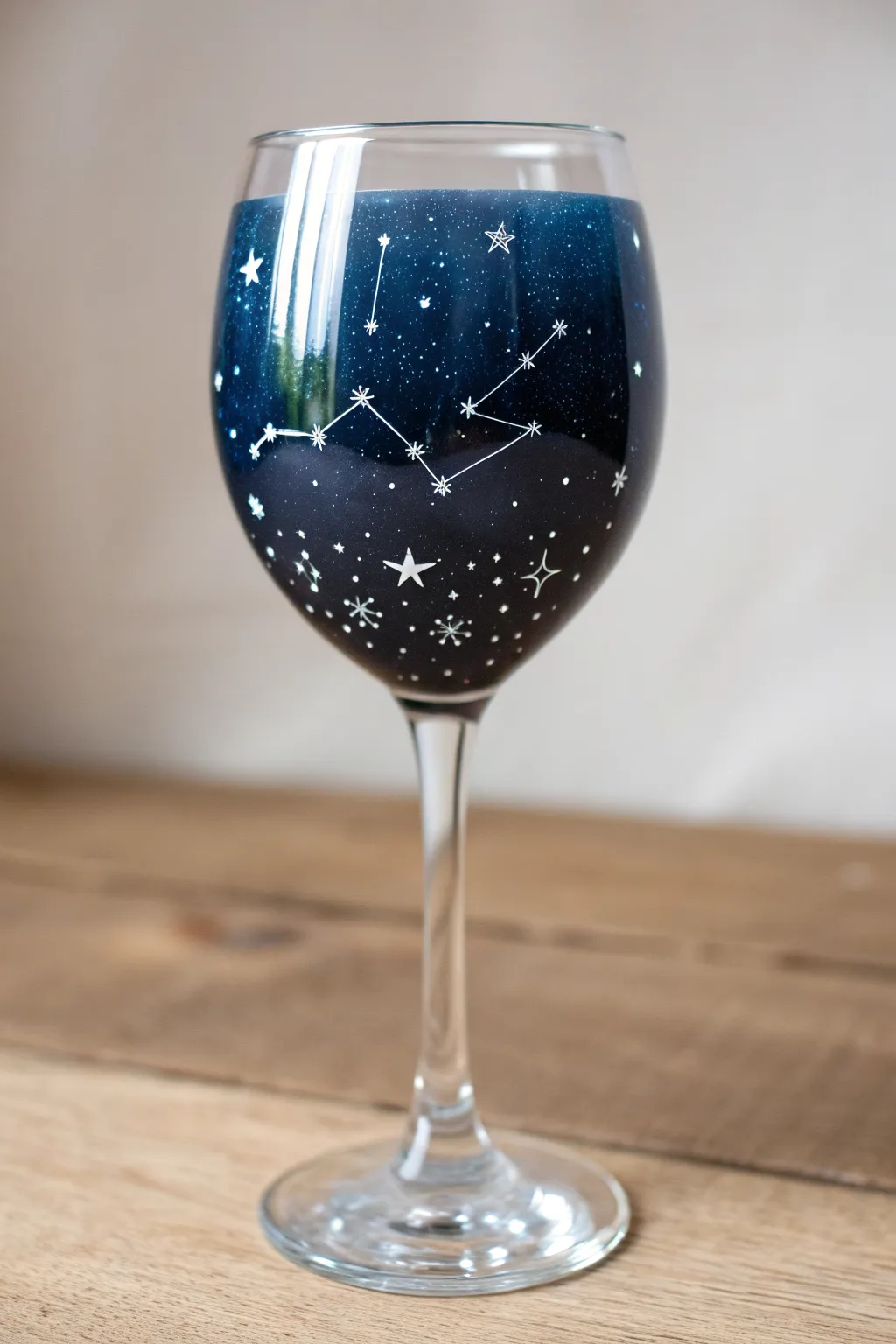 Night sky constellation dots on a wine glass, an easy beginner design with magical contrast