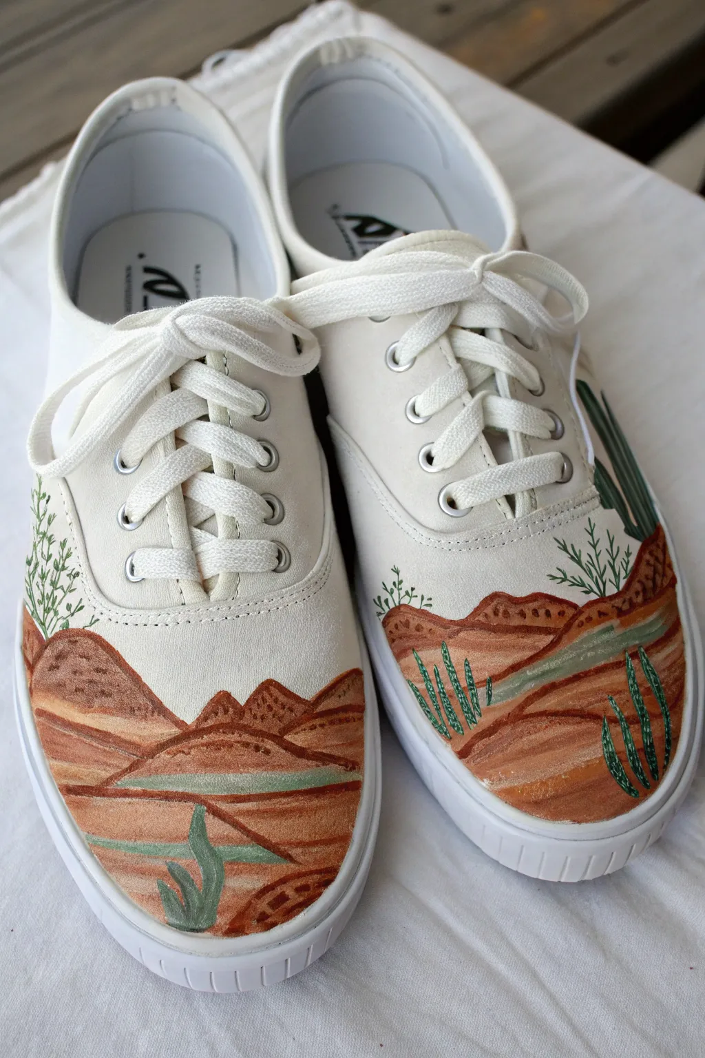 Heel-to-heel sneakers create one seamless mini mural, perfect for a split-pair shoe painting idea
