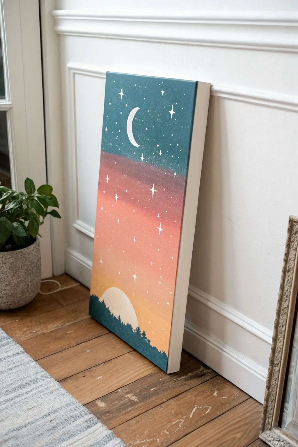 Easy split sun and moon painting: warm sunset meets cool night with one connected silhouette