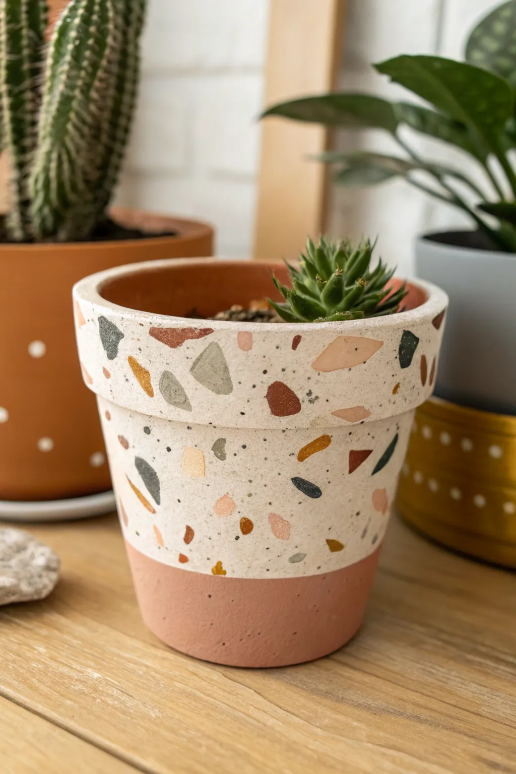 Terrazzo speckled terracotta pot with subtle metallic flecks for minimalist boho decor.