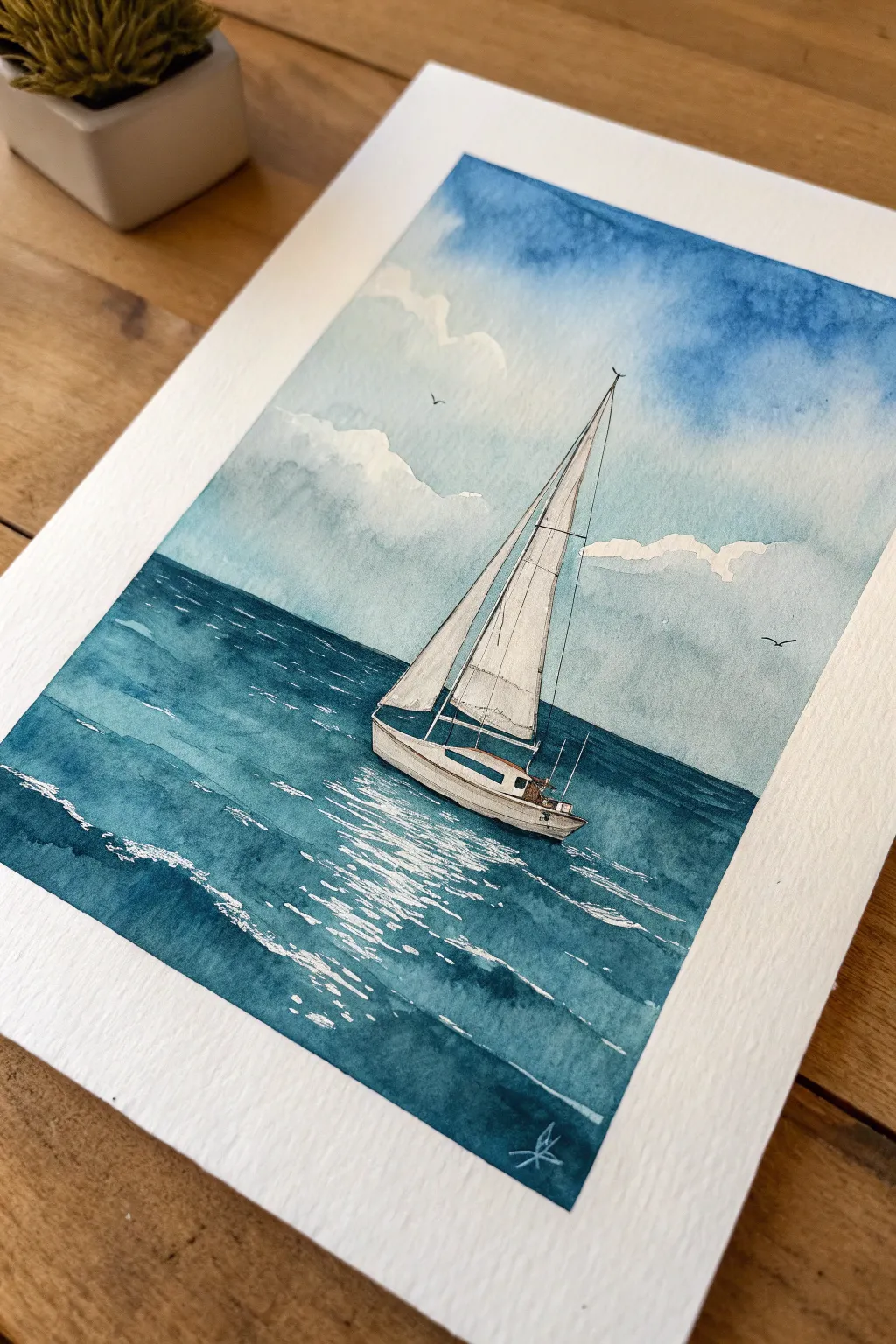 Minimal negative-space sailboat: paint sea and sky first, let the bright paper become the boat.