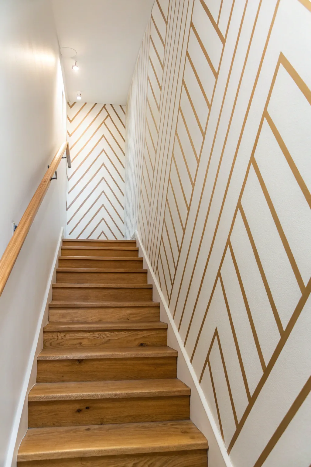 Diagonal tape stripes that climb the stairwell for an easy minimalist look with soft boho warmth.