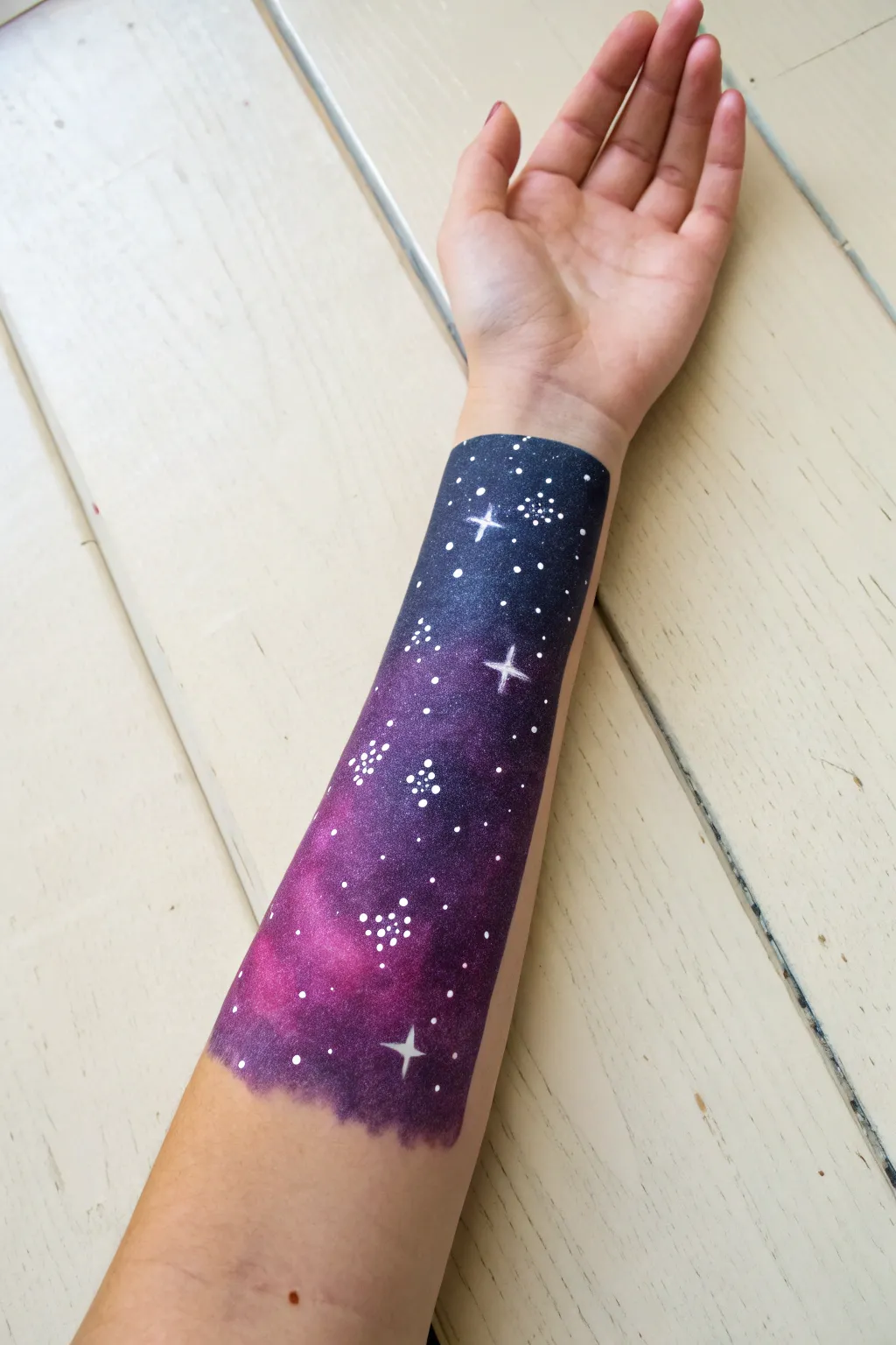 Easy galaxy arm smudge: deep purple nebula blend with flicked star splatter and highlights