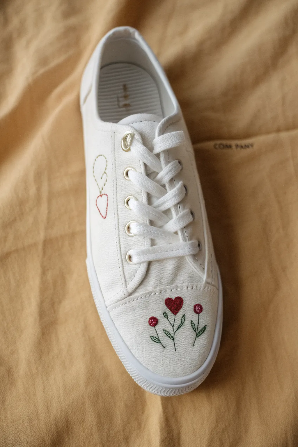 Minimalist canvas sneaker with bold stitch-outline embroidery for an easy, handmade upgrade today.
