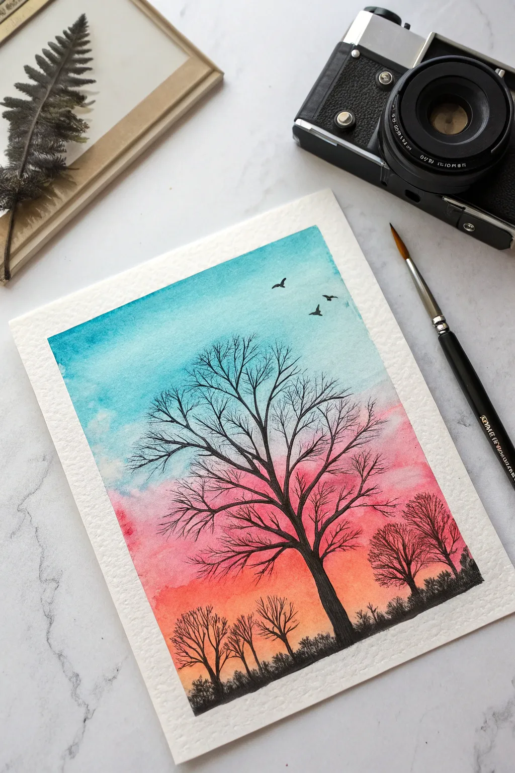 Crisp silhouette stencil over a vibrant sunset wash for the cleanest shadow painting effect.