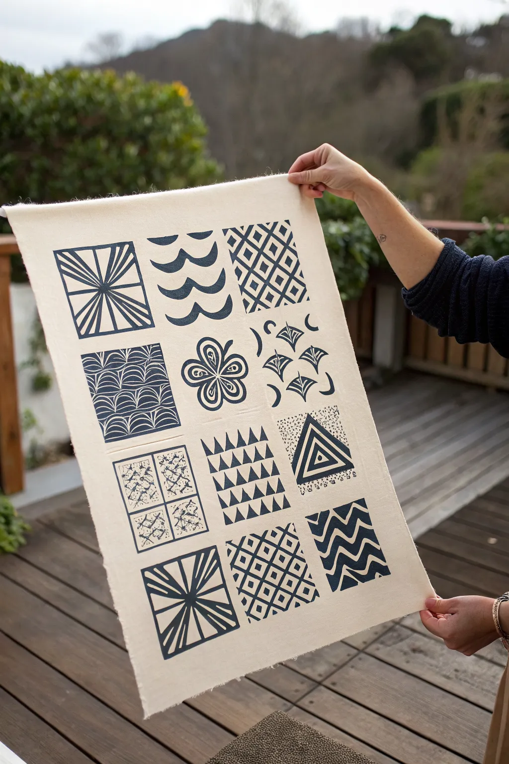 Pattern sampler tile grid for linocut ideas, bold textures in a clean minimalist palette