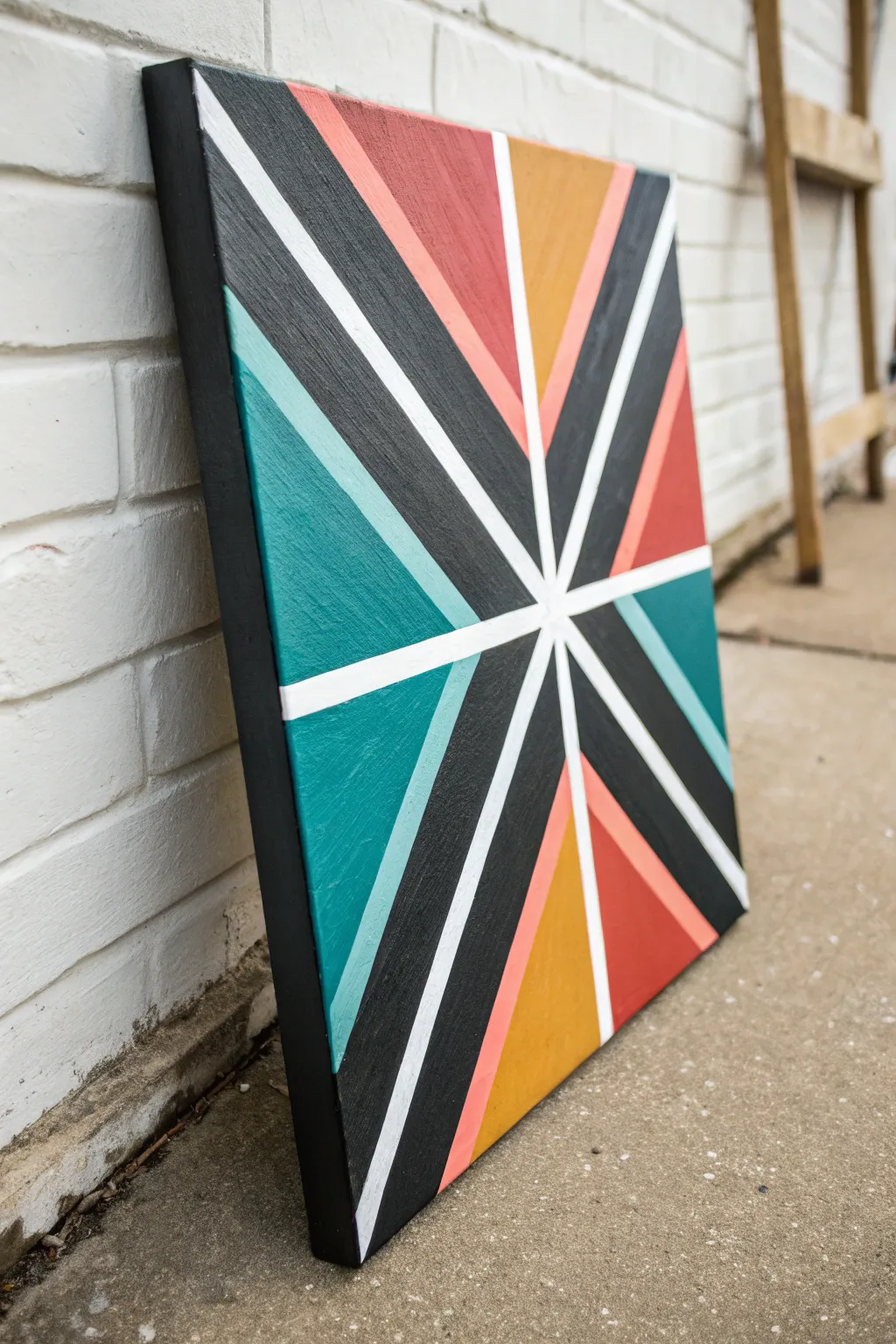 Easy tape-resist light beams on black: bold geometric color that feels modern and calm.