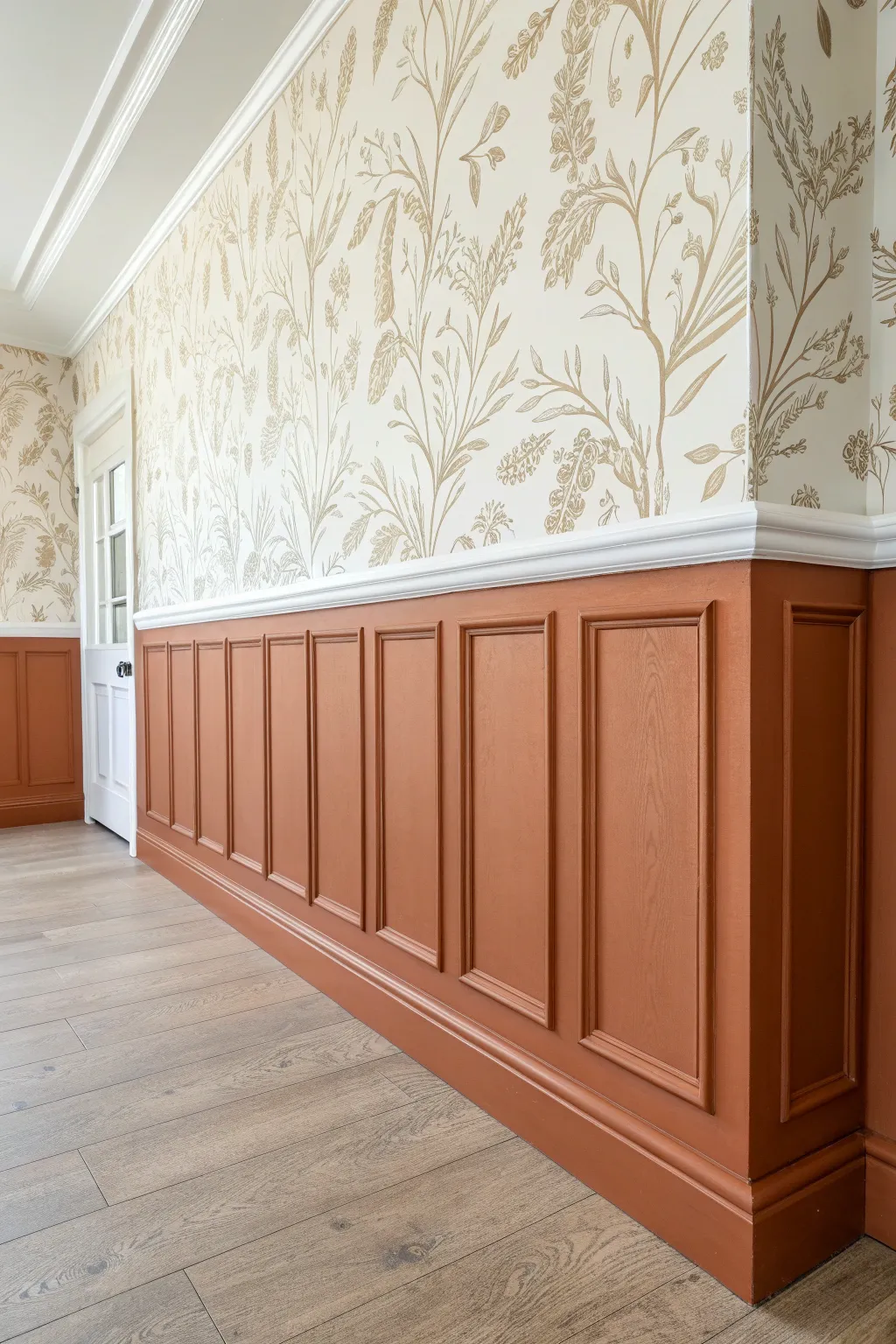 Texture-on-texture: bold painted paneling paired with wallpaper for a balanced, pin-worthy wall