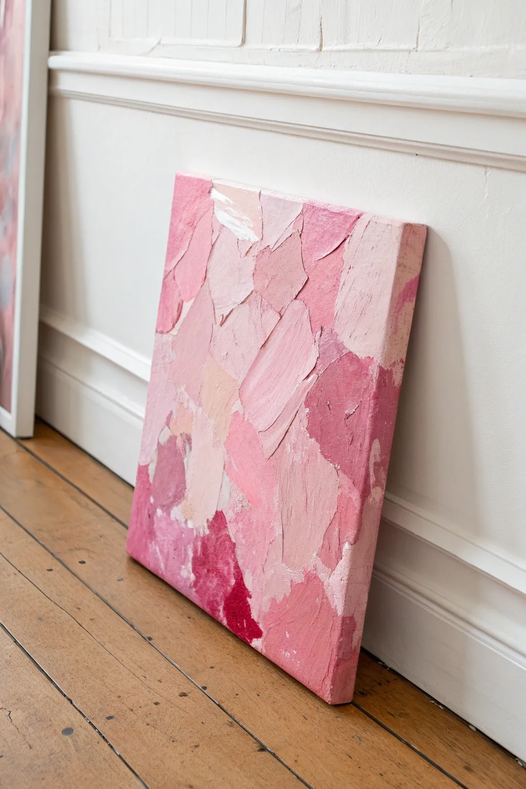 Pink mixed-media collage canvas with torn-paper texture, minimalist boho contrast and depth