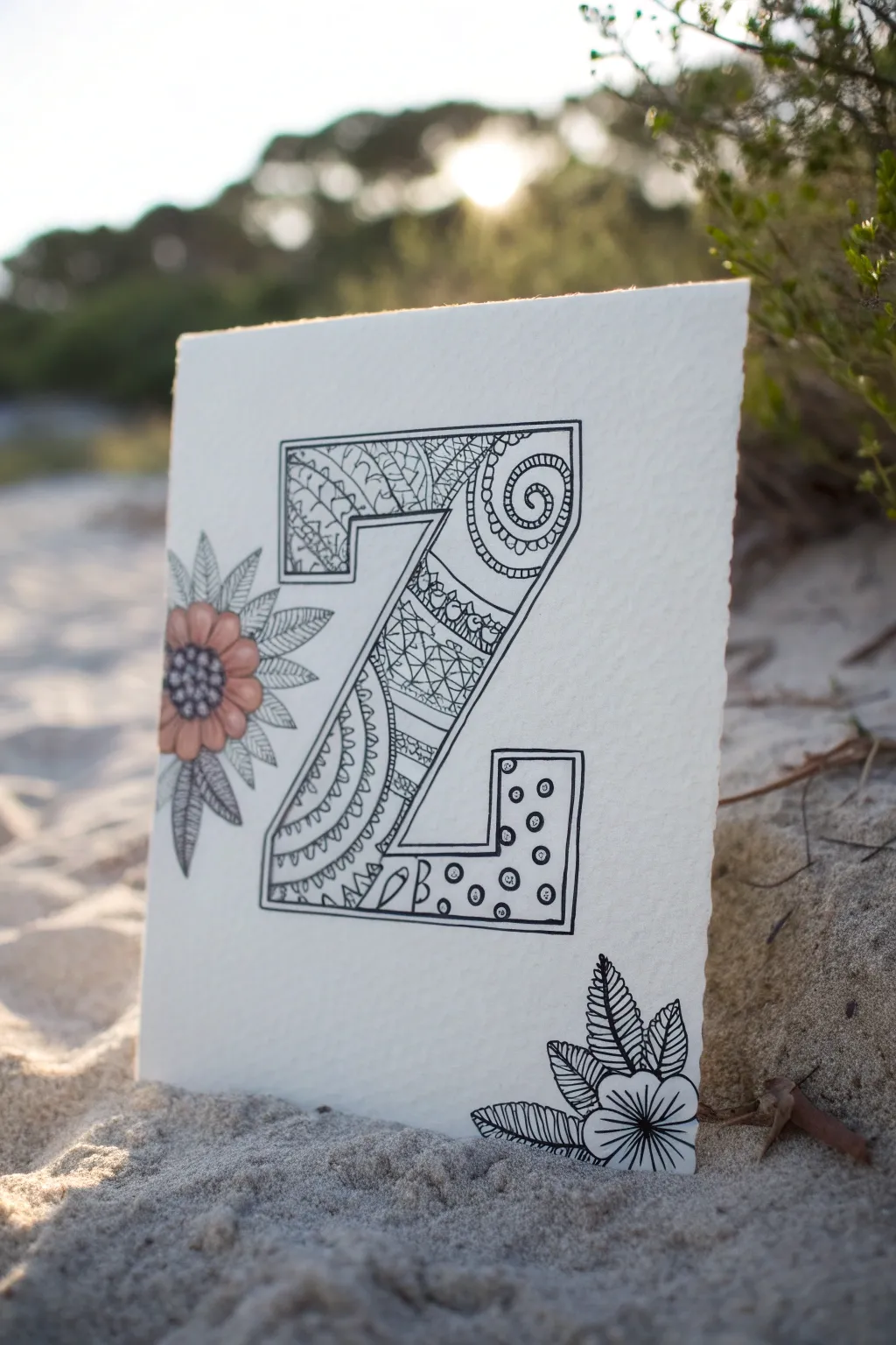 Typographic tangling: one bold block letter filled with mini Zentangle patterns in striking boho color