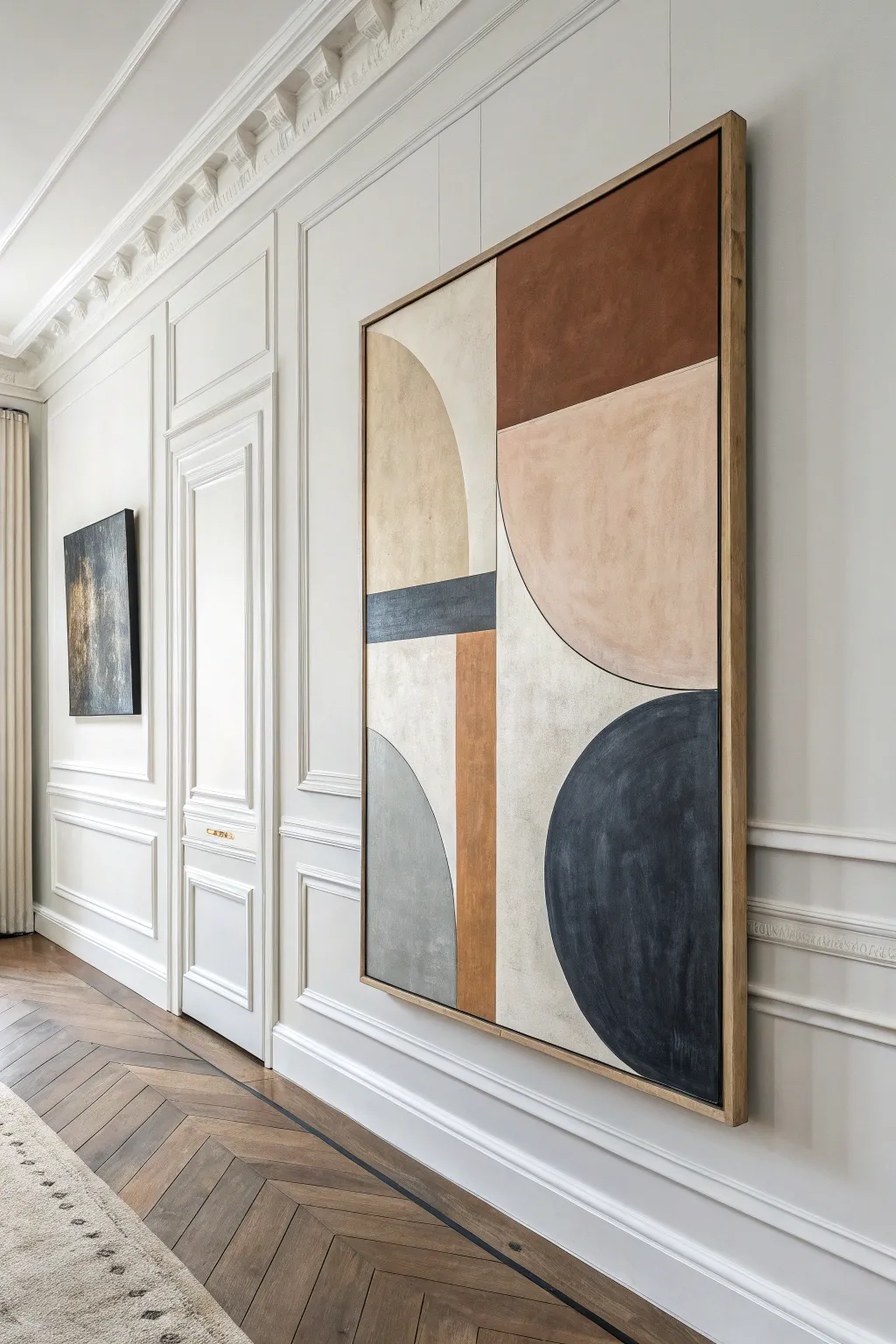 Neutral minimalist abstract shapes in soft beige and gray with a bold black accent