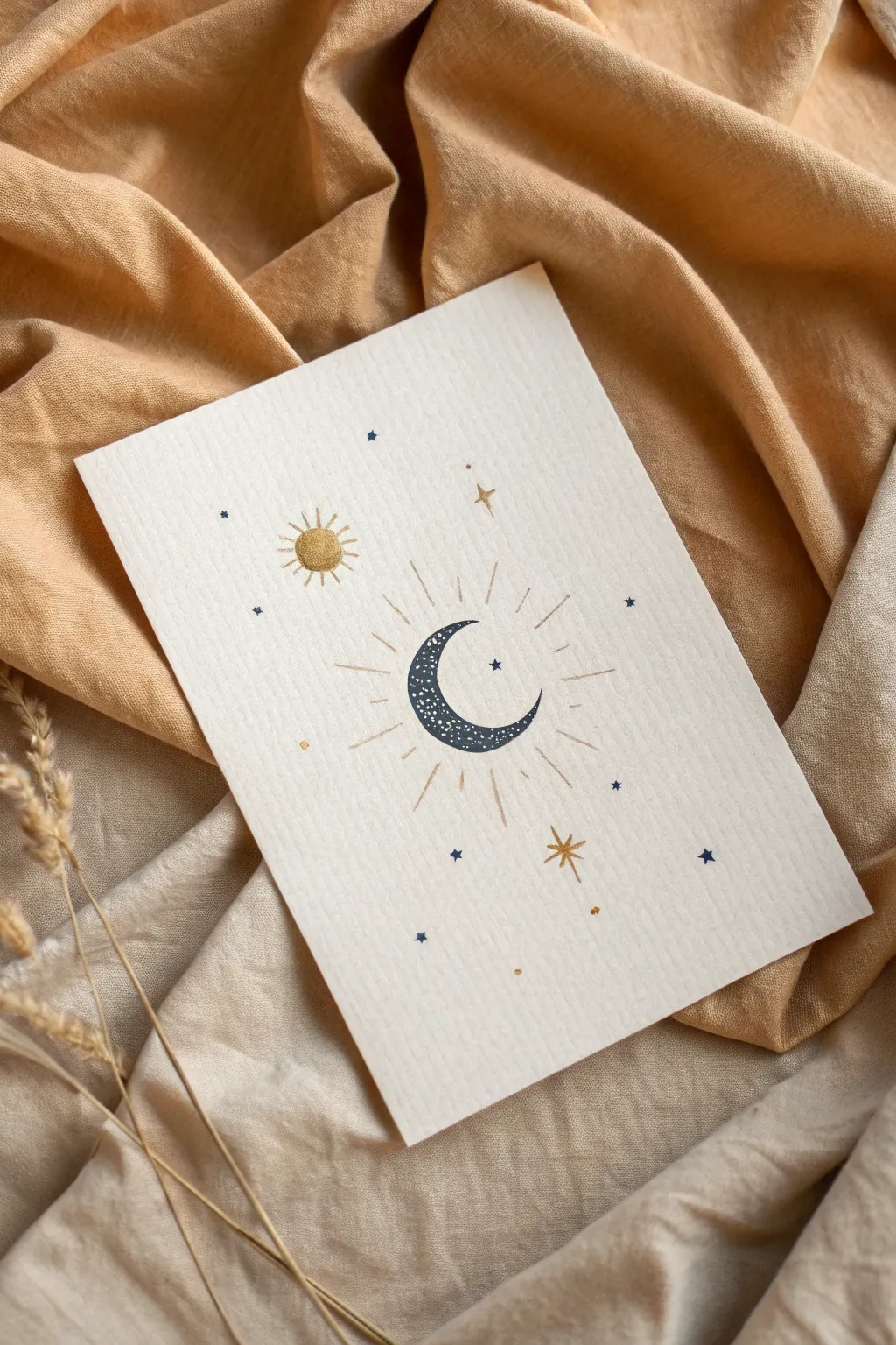 Two-tone celestial doodle in navy and gold, simple sun and moon for an elegant color story