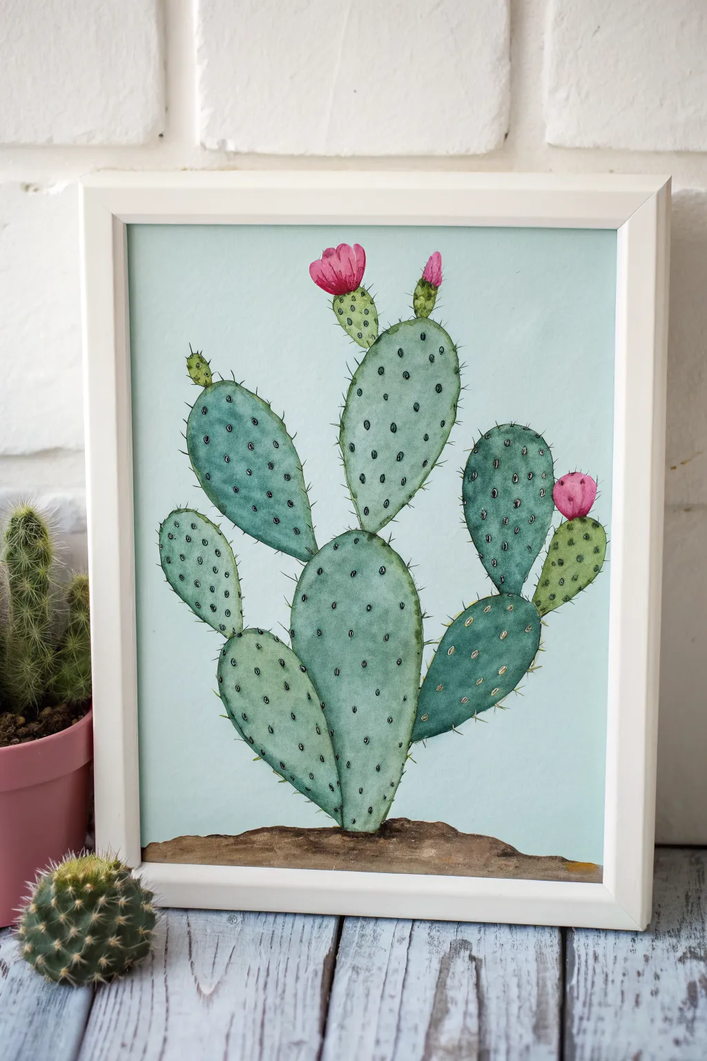 Easy prickly pear cactus study in layered greens with hot pink fruit on turquoise