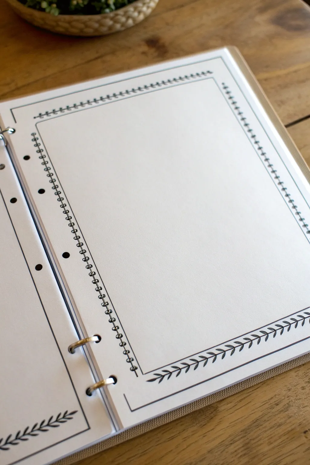 Minimalist binder insert with a clean centered title block and delicate double-line border, no text