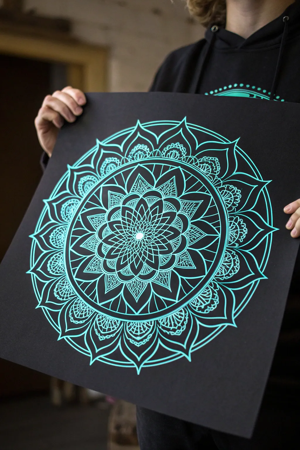 Bright UV mandala linework on black paper, perfectly centered and glowing with high contrast.