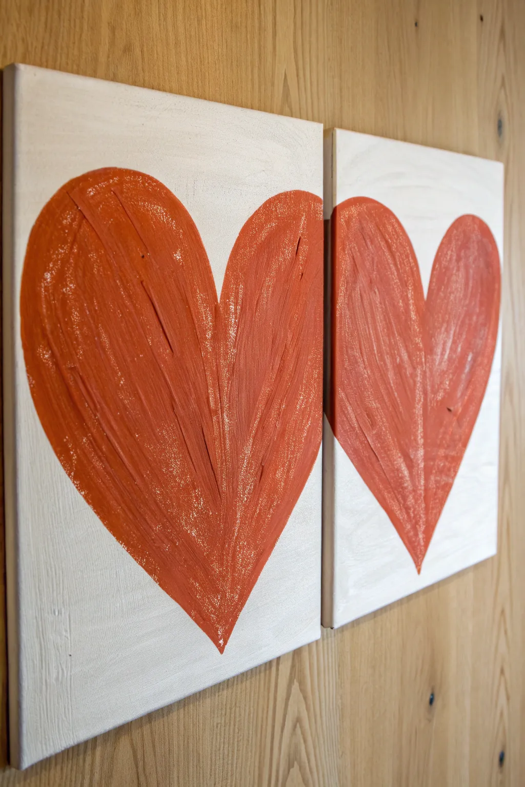 Two canvases, one heart, soft evening glow and bold brushstrokes for a romantic date night paint idea