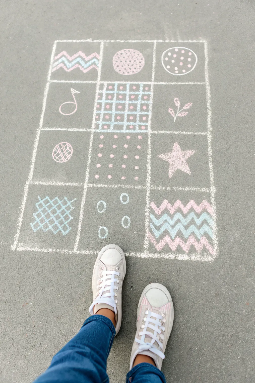 Patterned hopscotch chalk squares with a sneaker mid-step, minimalist playful summer vibe.