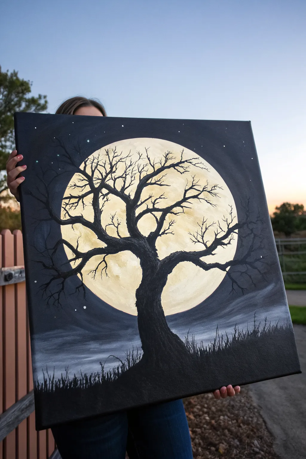 Spooky-simple acrylic: a gnarled black tree silhouette glowing against a full moon halo.