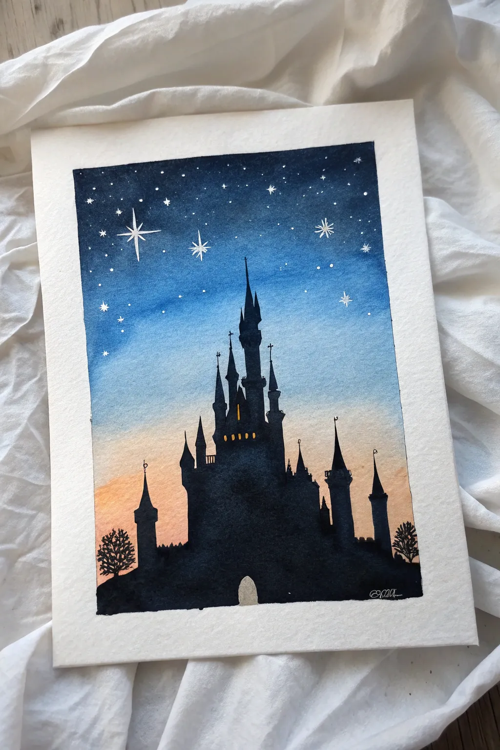 Dreamy minimalist fairytale castle silhouette against a deep indigo starry night sky