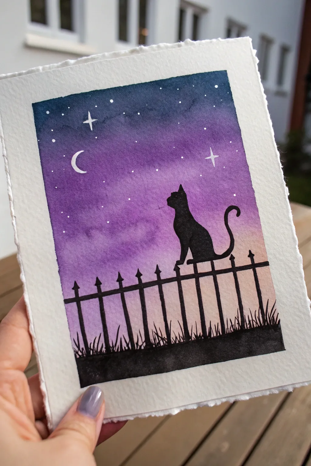 Minimal black cat silhouette on a fence, set against a dreamy purple night sky gradient.