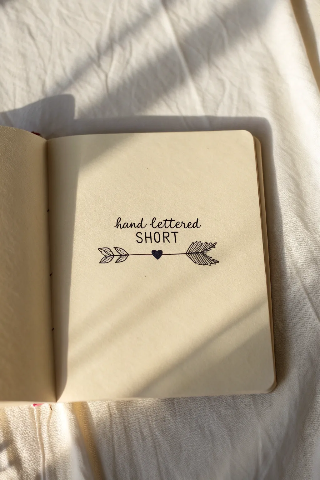 Minimal hand-lettering with crossed boho arrows, an easy hipster sketch you can recreate fast.