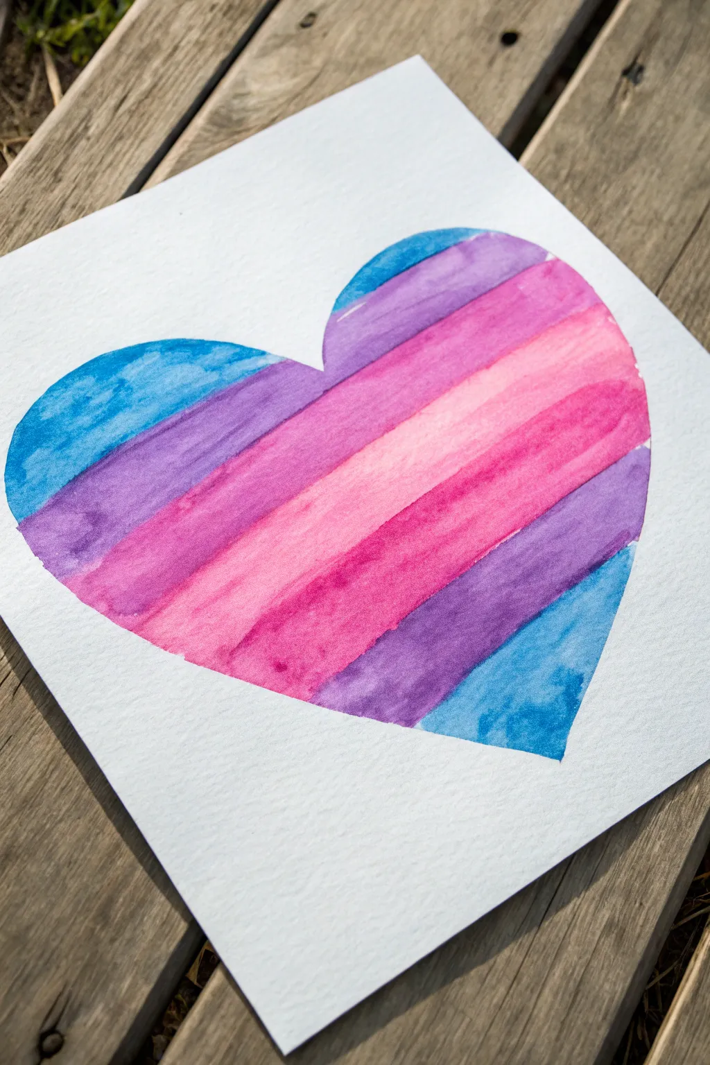Big blended watercolor heart in pink, purple, and blue for an easy kid-friendly painting win