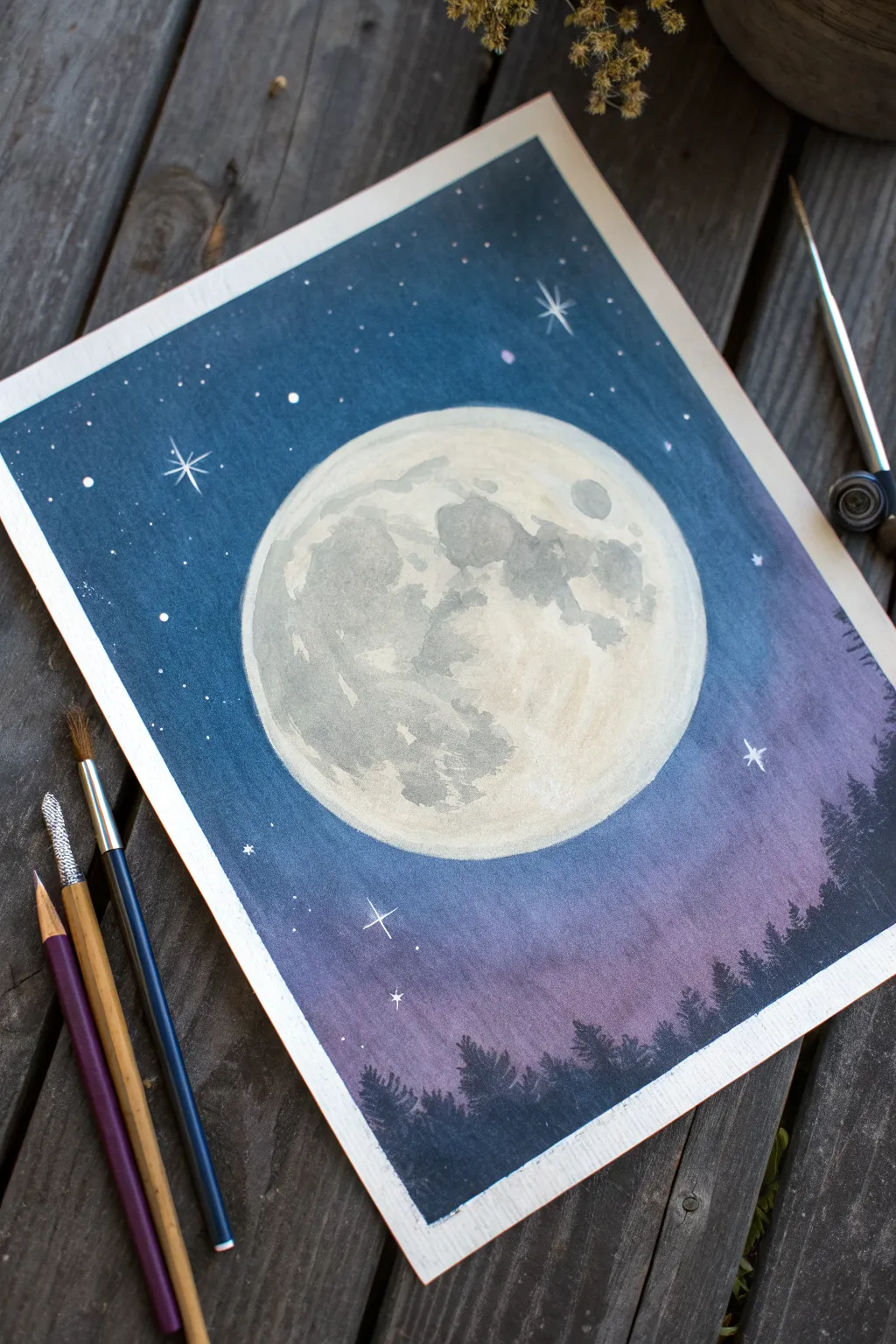 Easy pastel idea: a glowing full moon with a soft halo against a dreamy blue-purple night sky