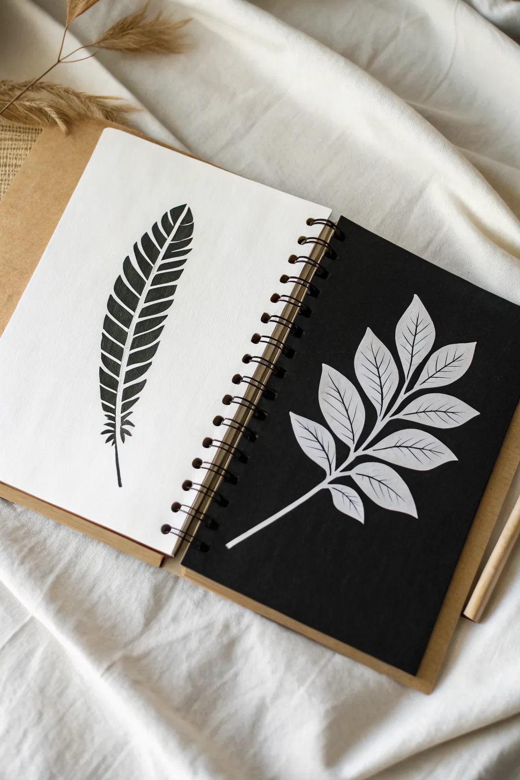 Half-and-half leaf study: black silhouette vs white negative space for an easy bold art page.