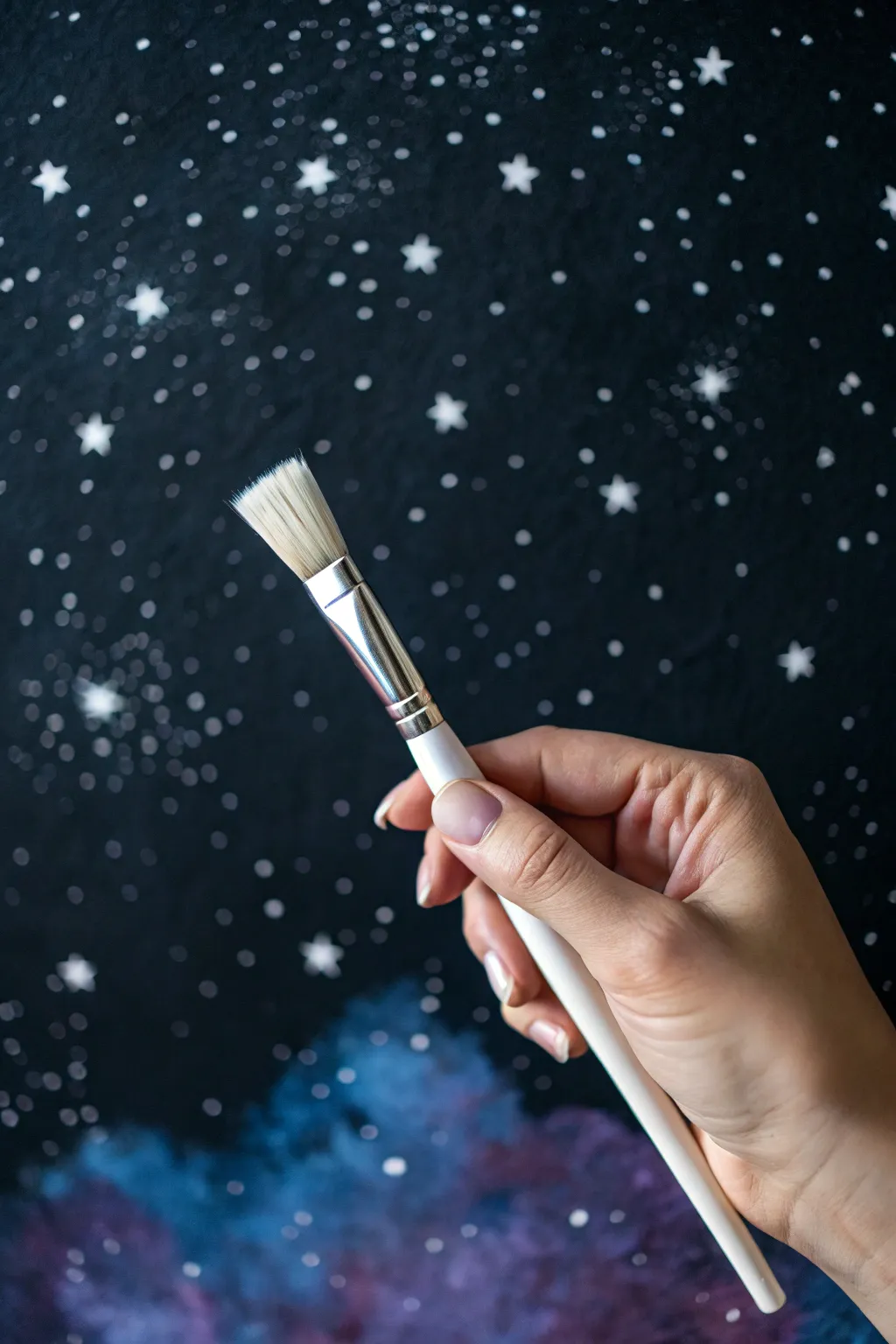 Layered star splatter stardust over a deep galaxy base for an easy, dreamy wall effect