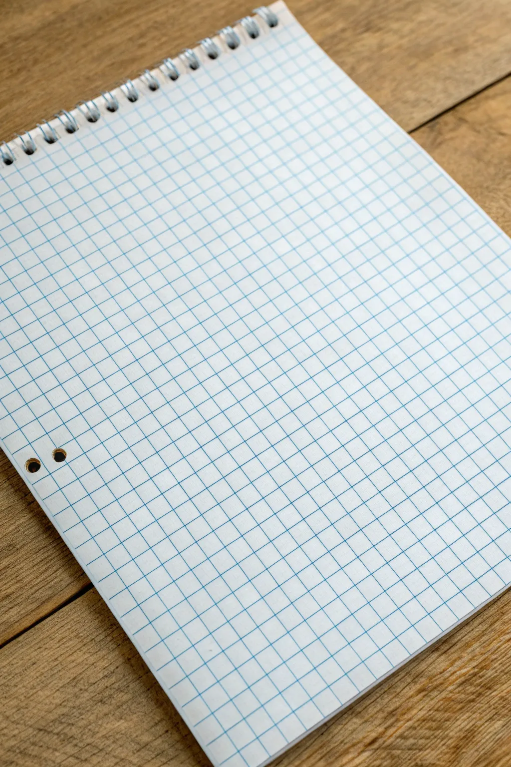 Minimal grid doodle: repeating diagonal lines, zigzags, and waves that line up square by square.