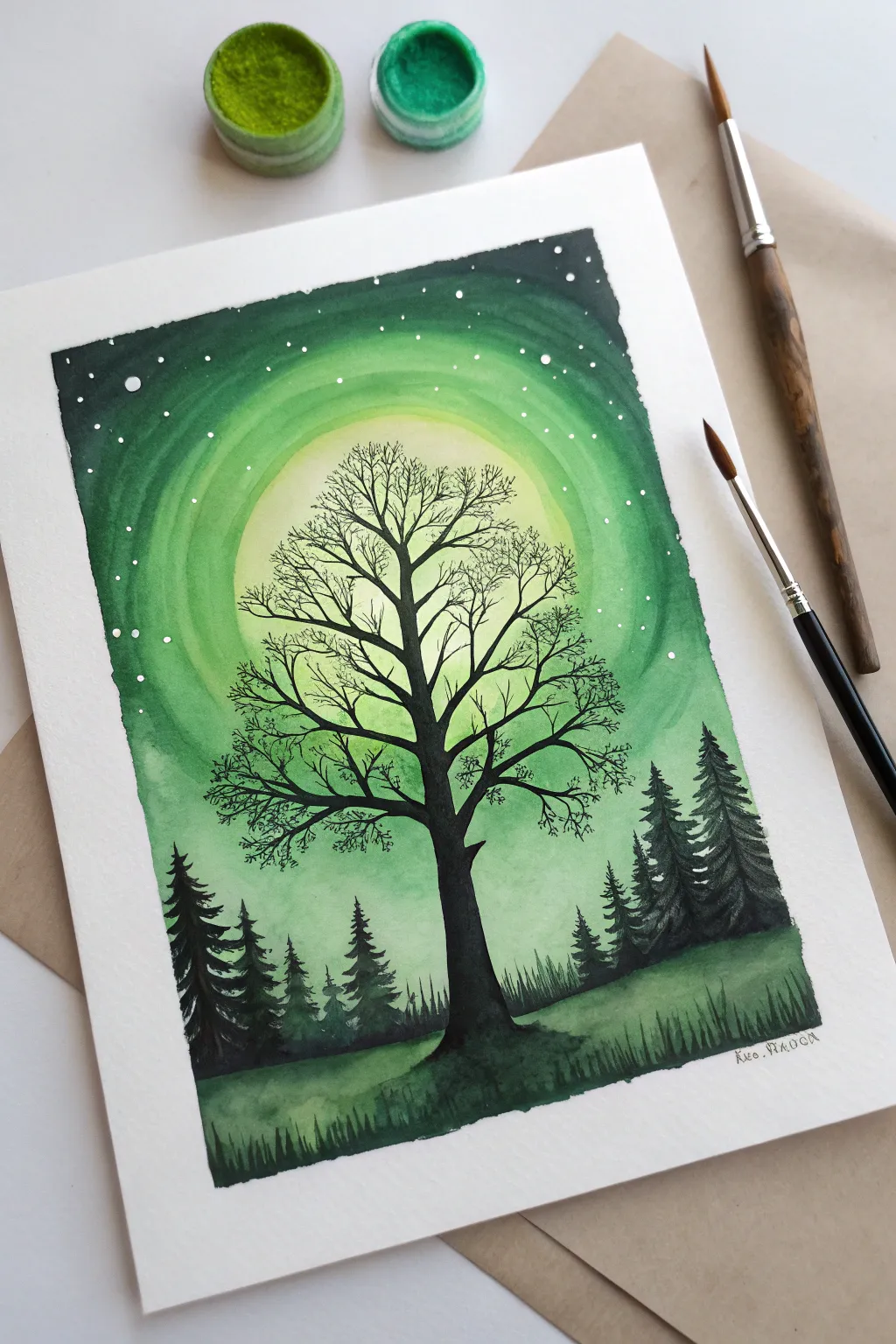 Minimal tree silhouette meets a glowing green halo, an easy Scandinavian-inspired painting idea.
