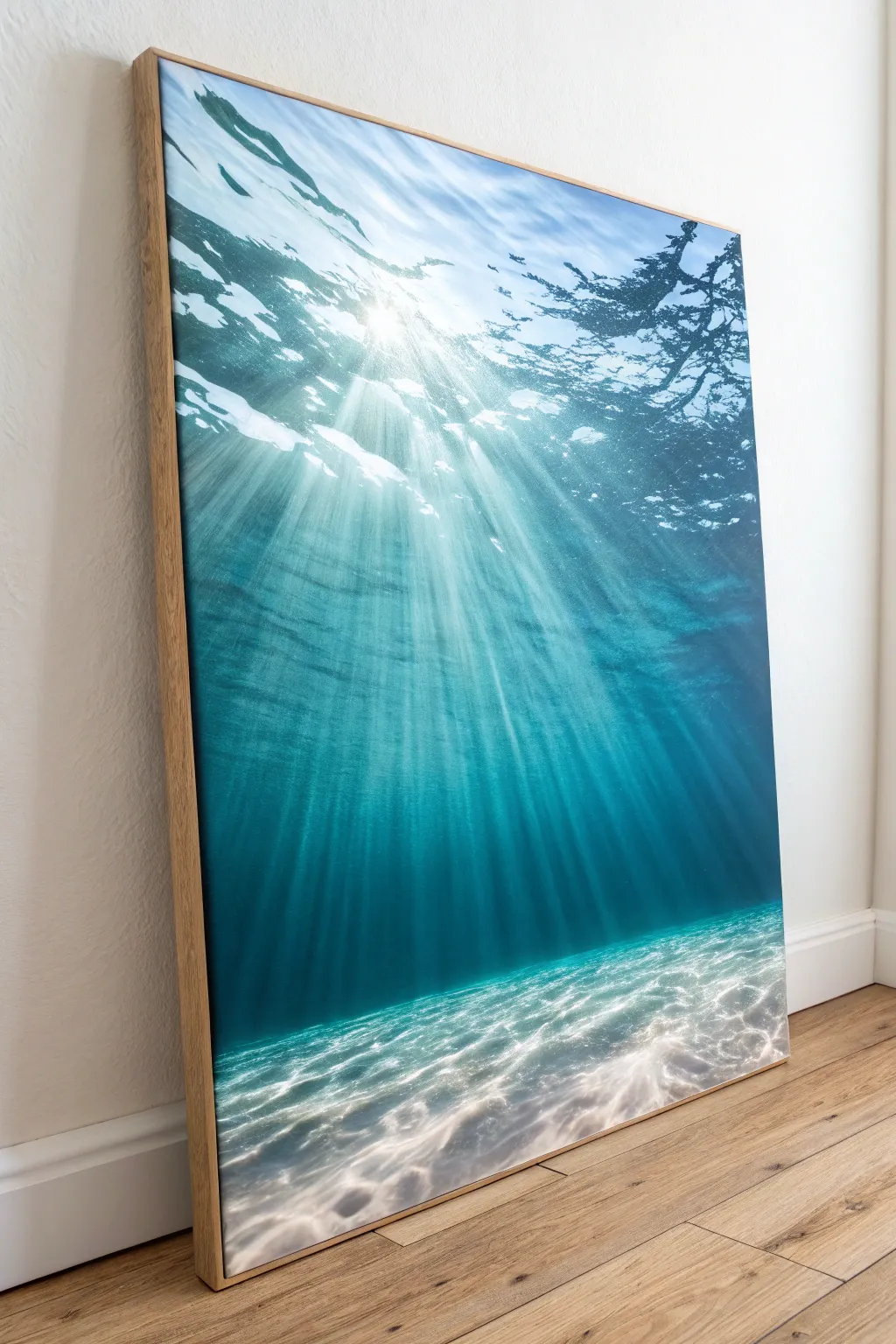 Minimal ocean mural art: sun-dappled surface rays in teal and blue with crisp highlights