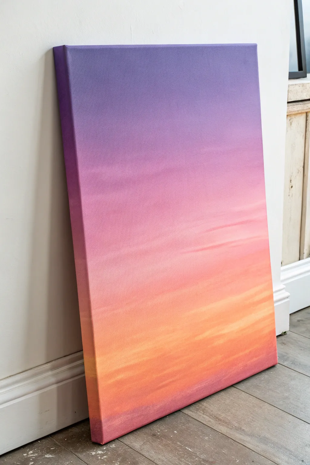 Sunset ombre canvas idea with a peach-to-pink-to-purple blend and a soft natural glow