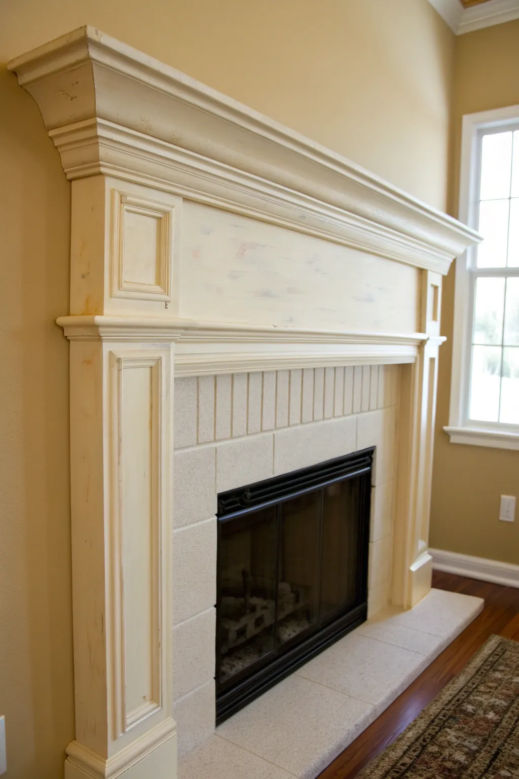 Creamy off-white mantel against warm walls for a soft, cozy blend and gentle contrast