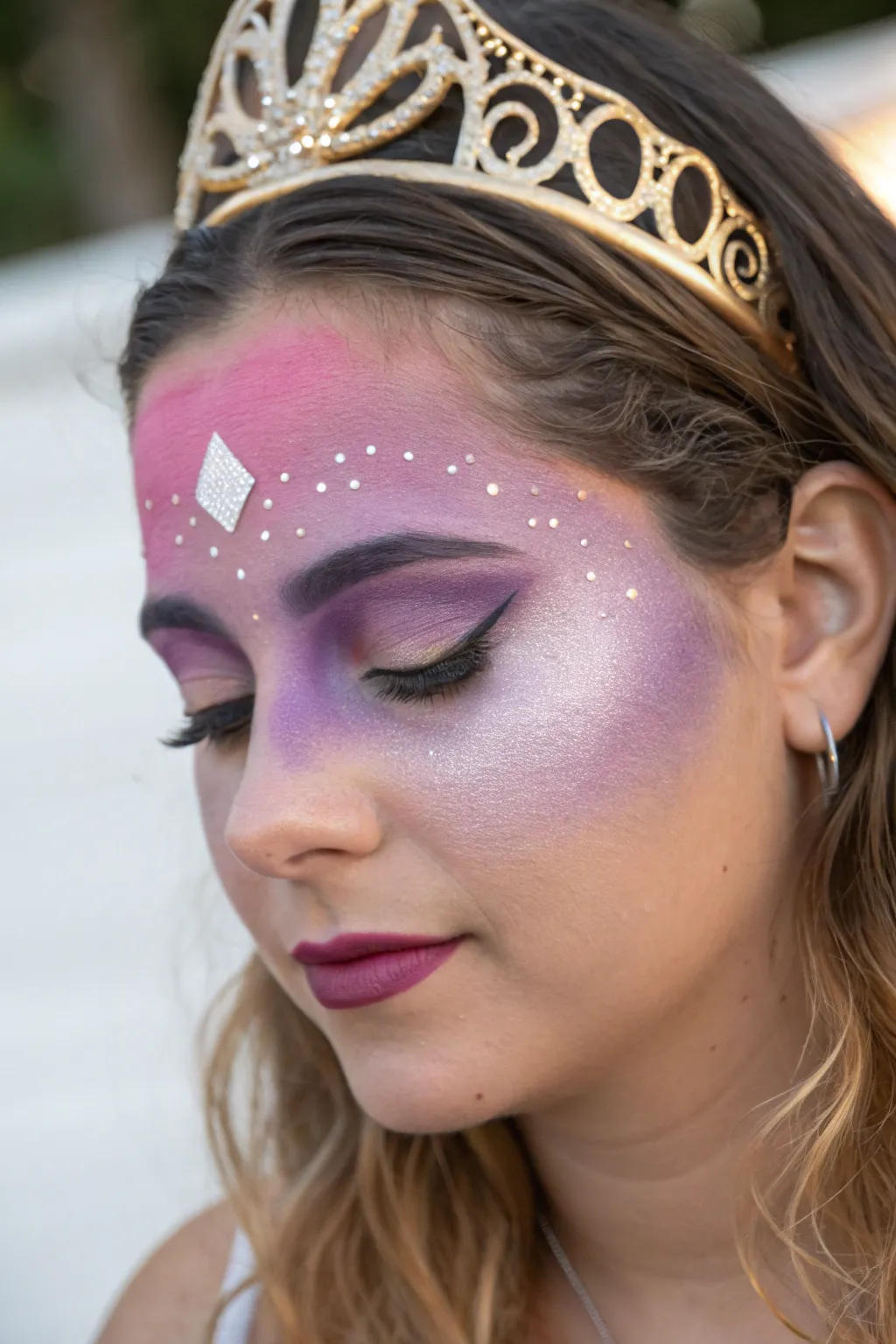 Purple to pink ombre princess mask with crisp crown detail and soft shimmer eyelids.