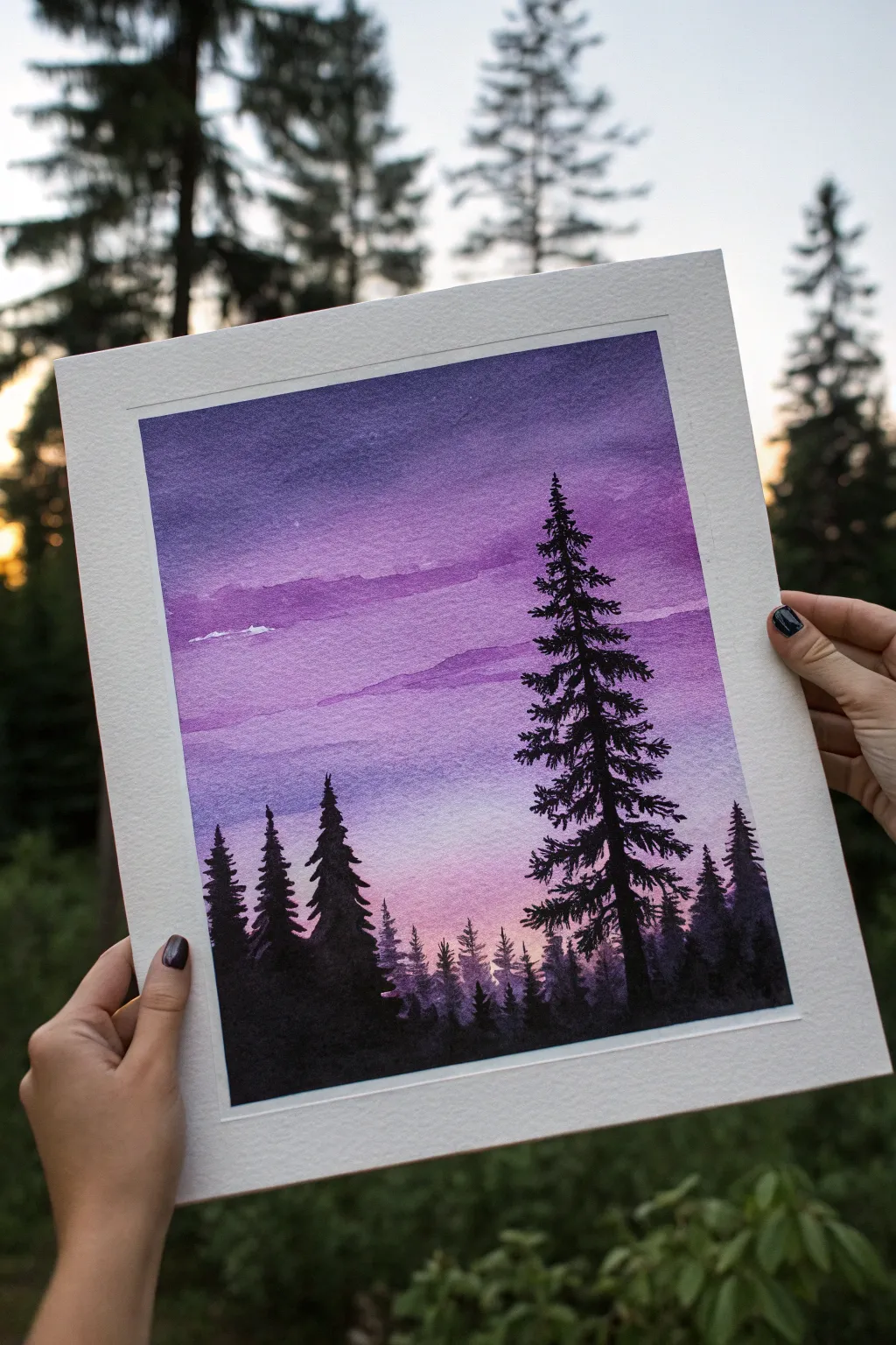 Silhouetted pine trees framing a glowing purple dusk sky, minimalist contrast with soft boho calm