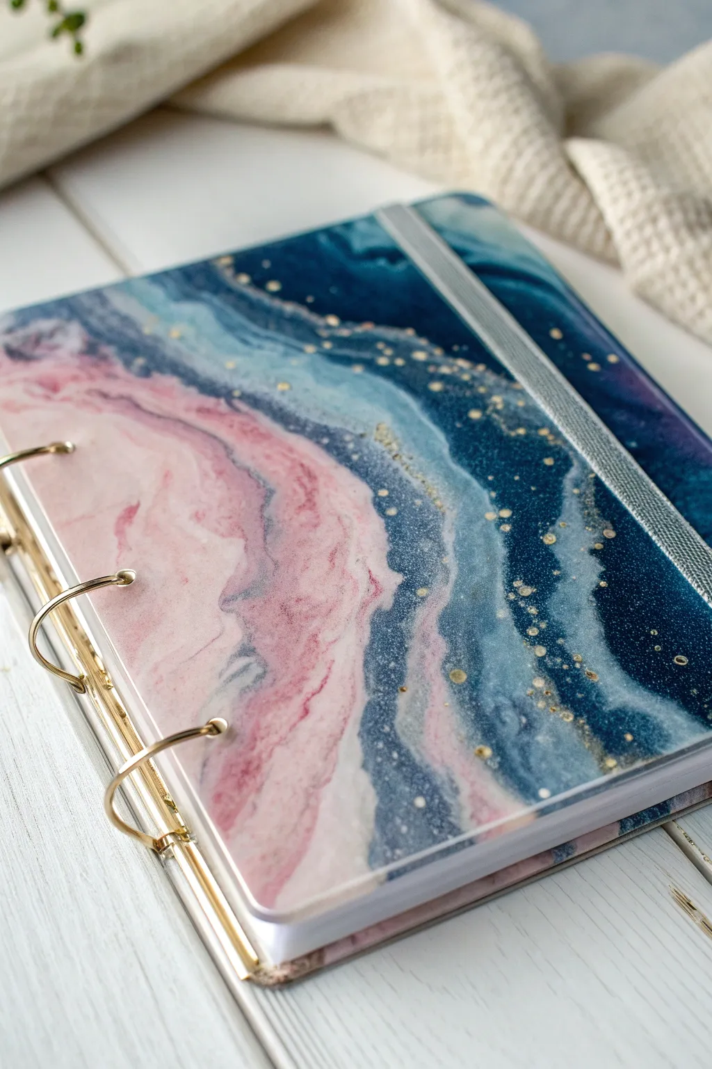 Dreamy alcohol ink smoke swirls floating in clear resin for a chic notebook cover idea
