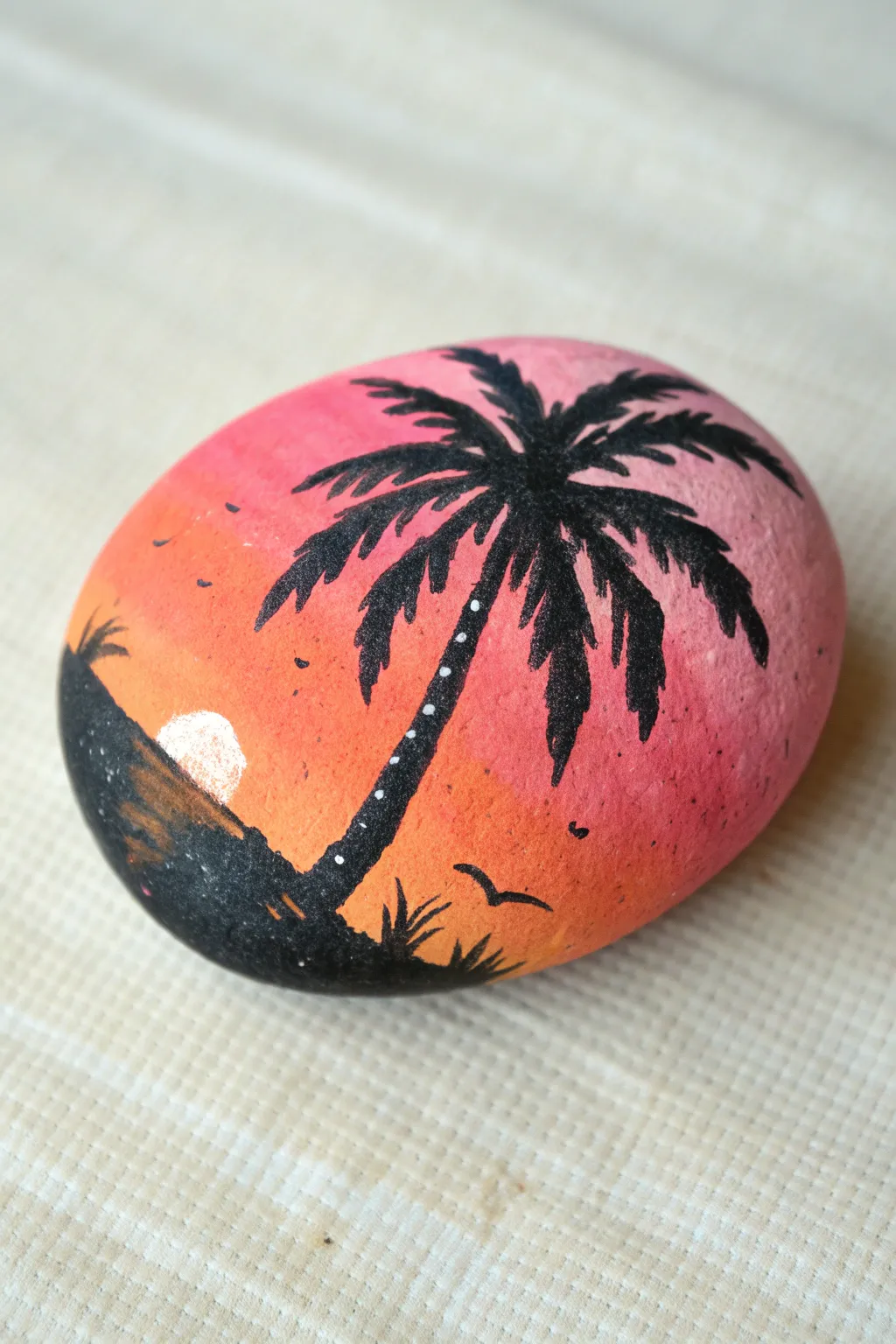 Palm tree silhouette rock with glowing sunset gradient, minimalist boho vibe for easy painting