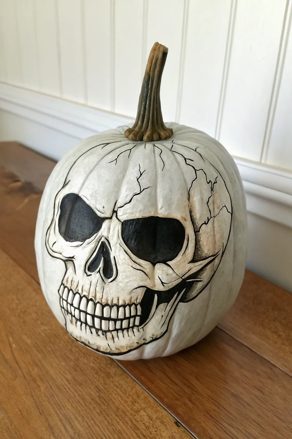 Cracked skull-face pumpkin with smoky gray shading, perfect for chic adult Halloween painting