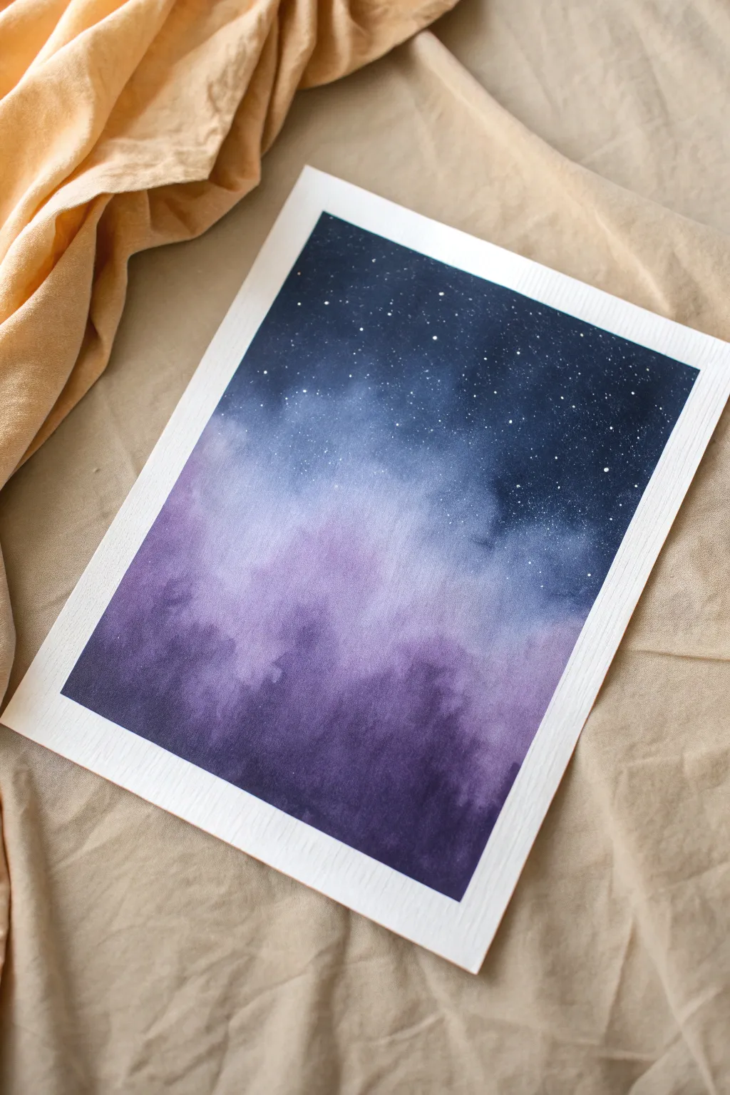 Soft galaxy spray paint gradient in deep blues and purples, with misty clouds and velvety texture