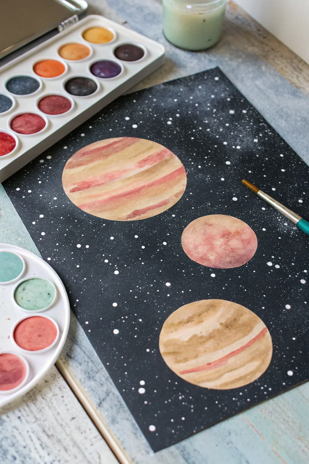 Spray paint planets with simple circular masks, revealing crisp edges on a bold, dark galaxy background