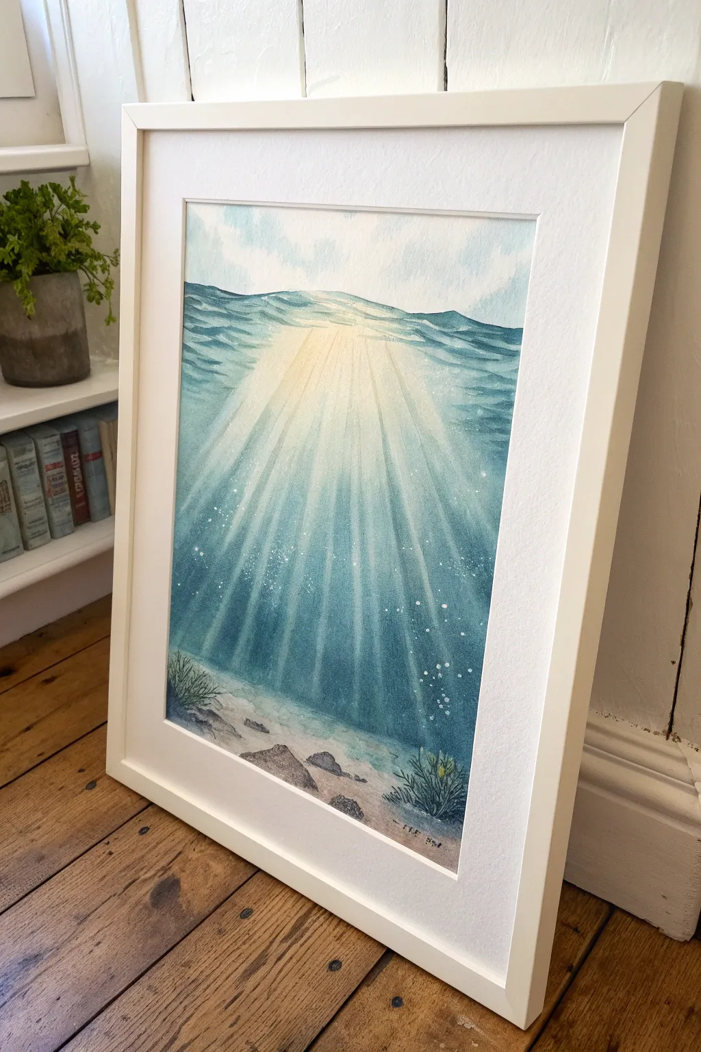 Minimal underwater sunbeam with soft surface rays, an easy ocean painting idea for beginners.