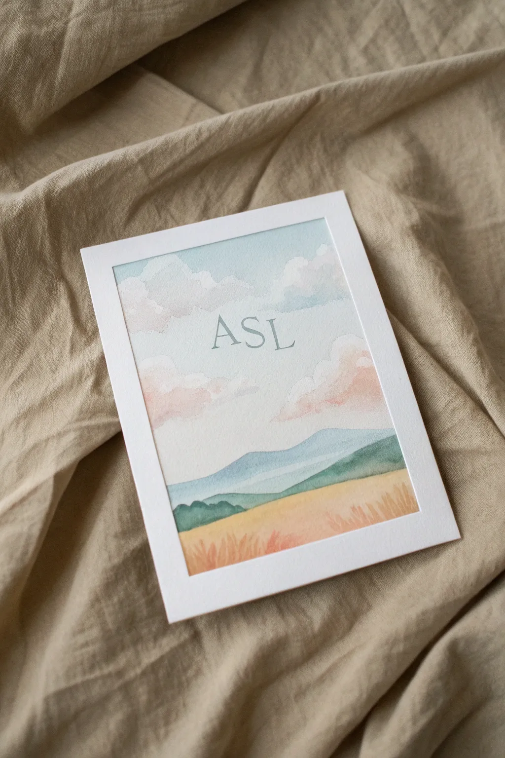 A serene landscape that secretly hides ASL fingerspelling in the clouds and hills.