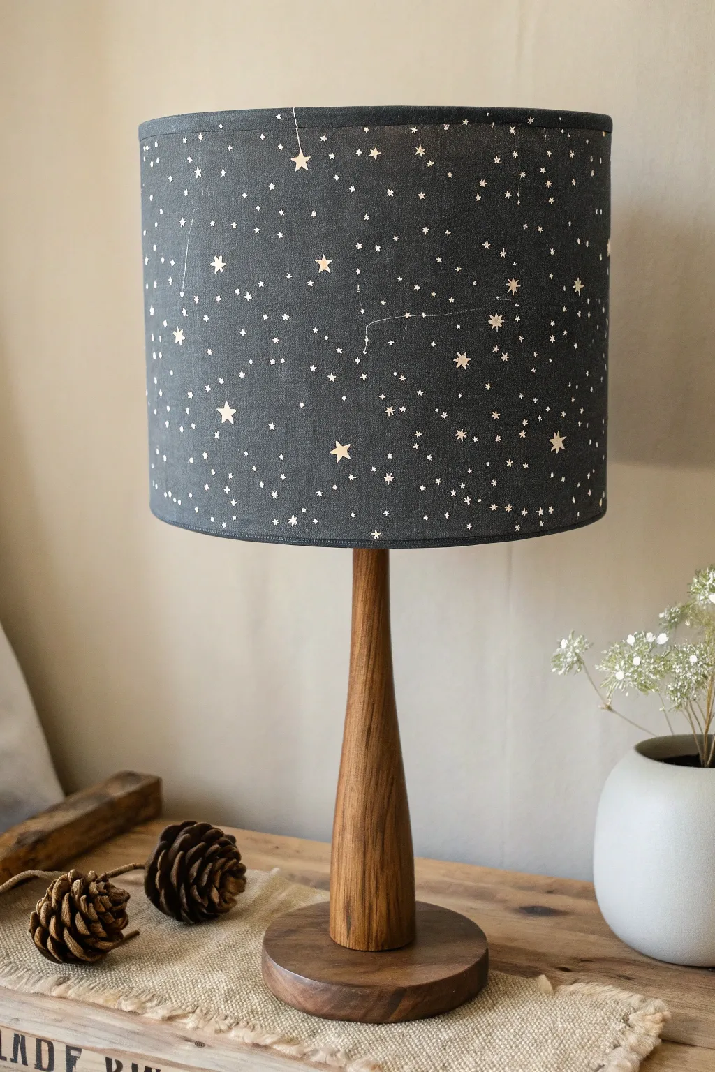 Paint a night-sky lampshade: minimal charcoal linen with constellations that glow after dark
