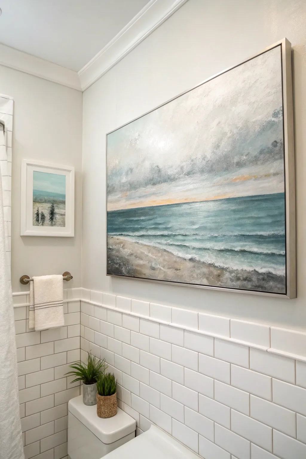 A calm coastal horizon canvas in muted blues and warm grays for a serene bathroom focal point.