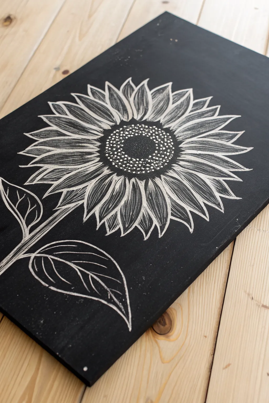 Bold sunflower scratchboard with dotted center and a visible in-progress corner for beginners