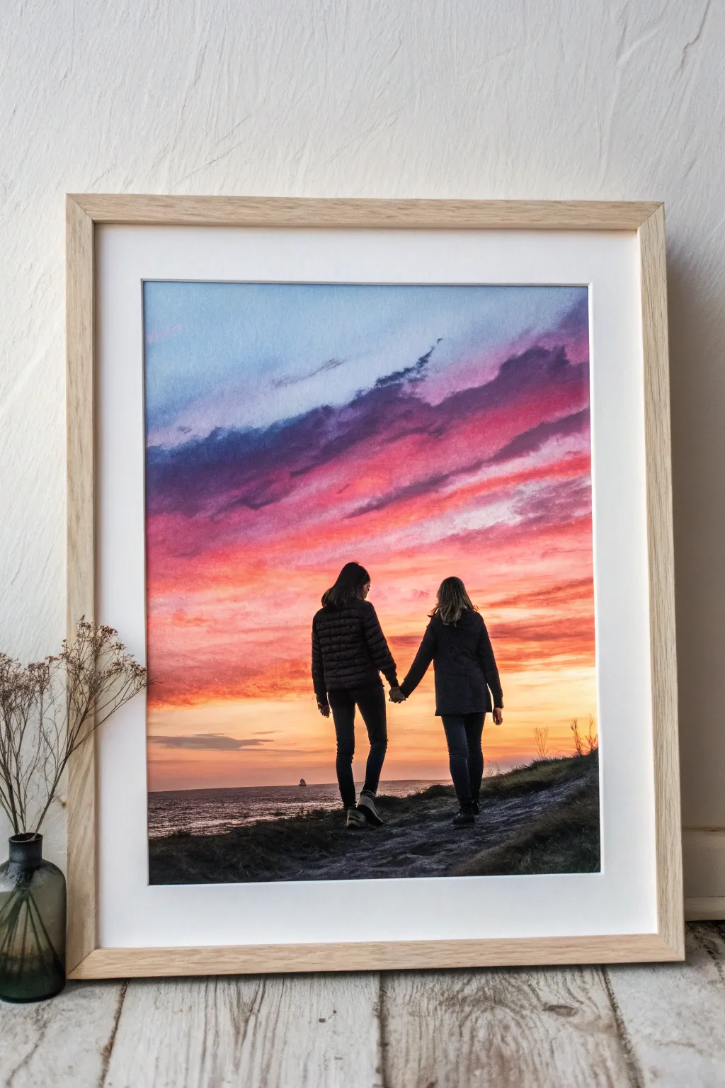 Bold sunset silhouettes holding hands, a simple best friend painting idea with striking contrast