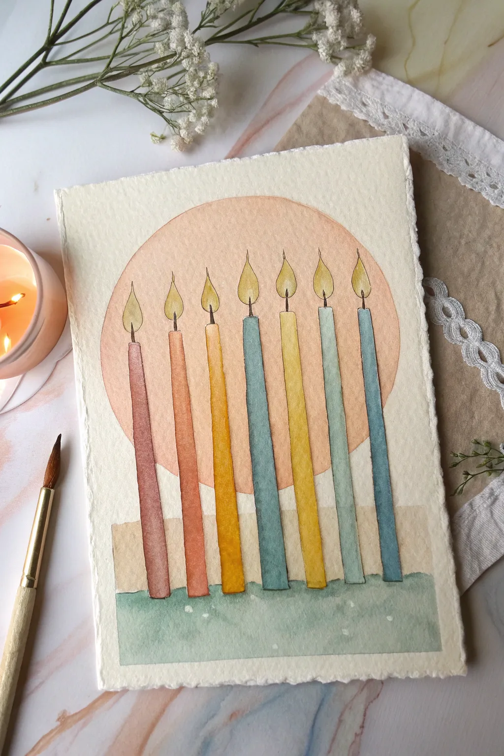 Tall pastel birthday candles with warm flickering glow highlights in a minimalist boho aesthetic